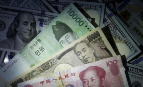 Давление на азиатские валюты сохранится в течение еще одного квартала - мнение